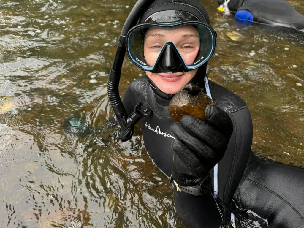 Virginia AFS member Kayla Howard performing a snorkel survey for freshwater mussels